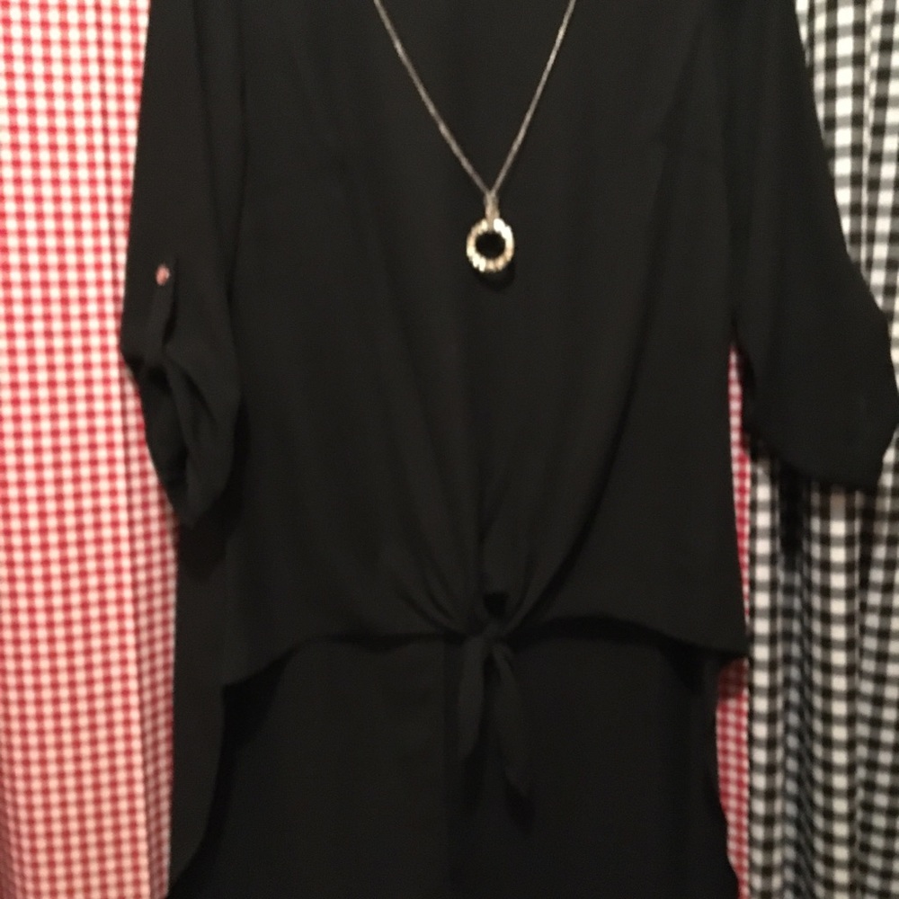 Beautiful black hi-low top. Size small.